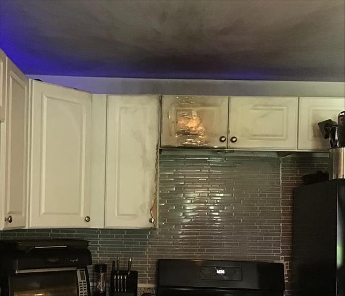 Kitchen affected by a fire damage